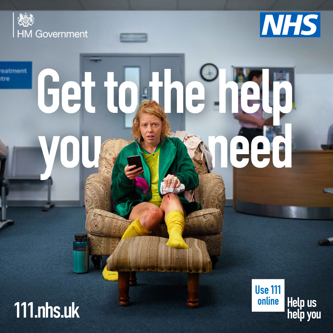 Woman sitting on chair with cut leg with her phone in her hand ready to call 111