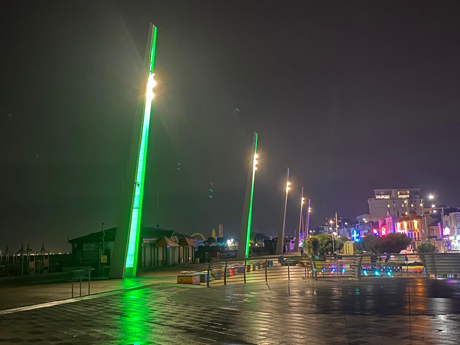 Southend seafront lit up green.