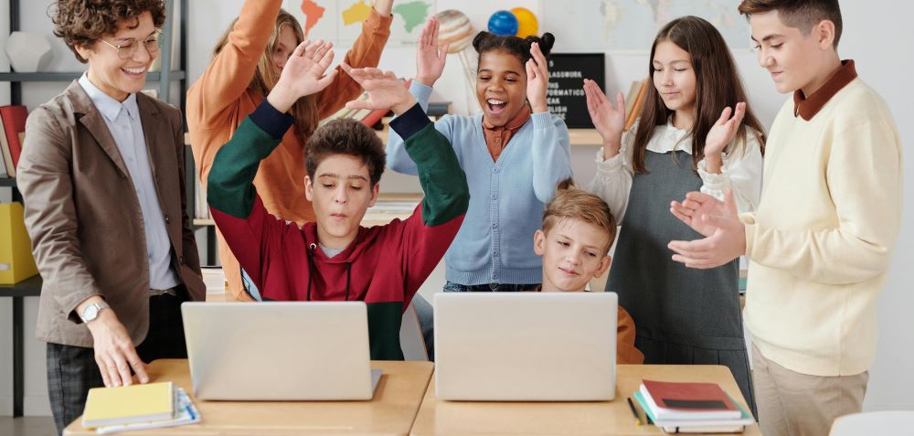 Children cheering in class